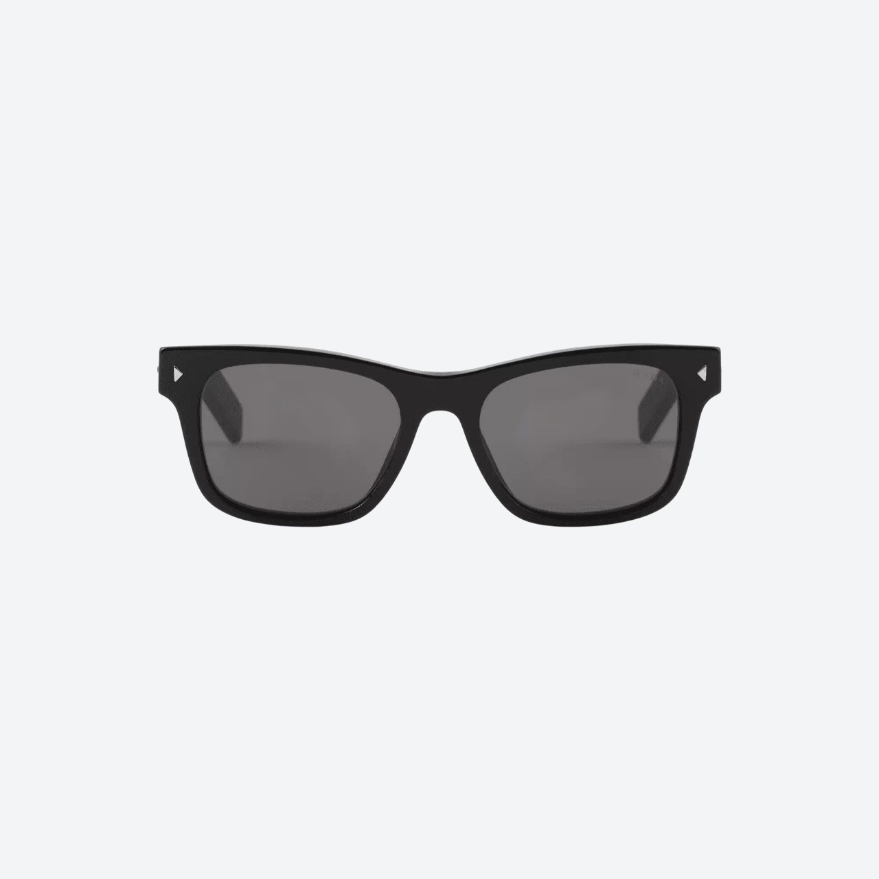 Close-up of black Prada sunglasses frame and hinge